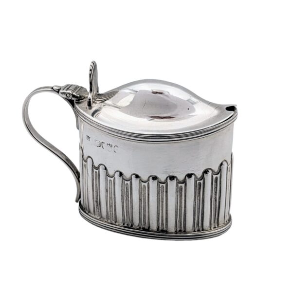 Mustard with blue glass insert - London 1888