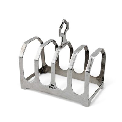 Silver four-division toast rack with central carrying handle, Sheffield 1936