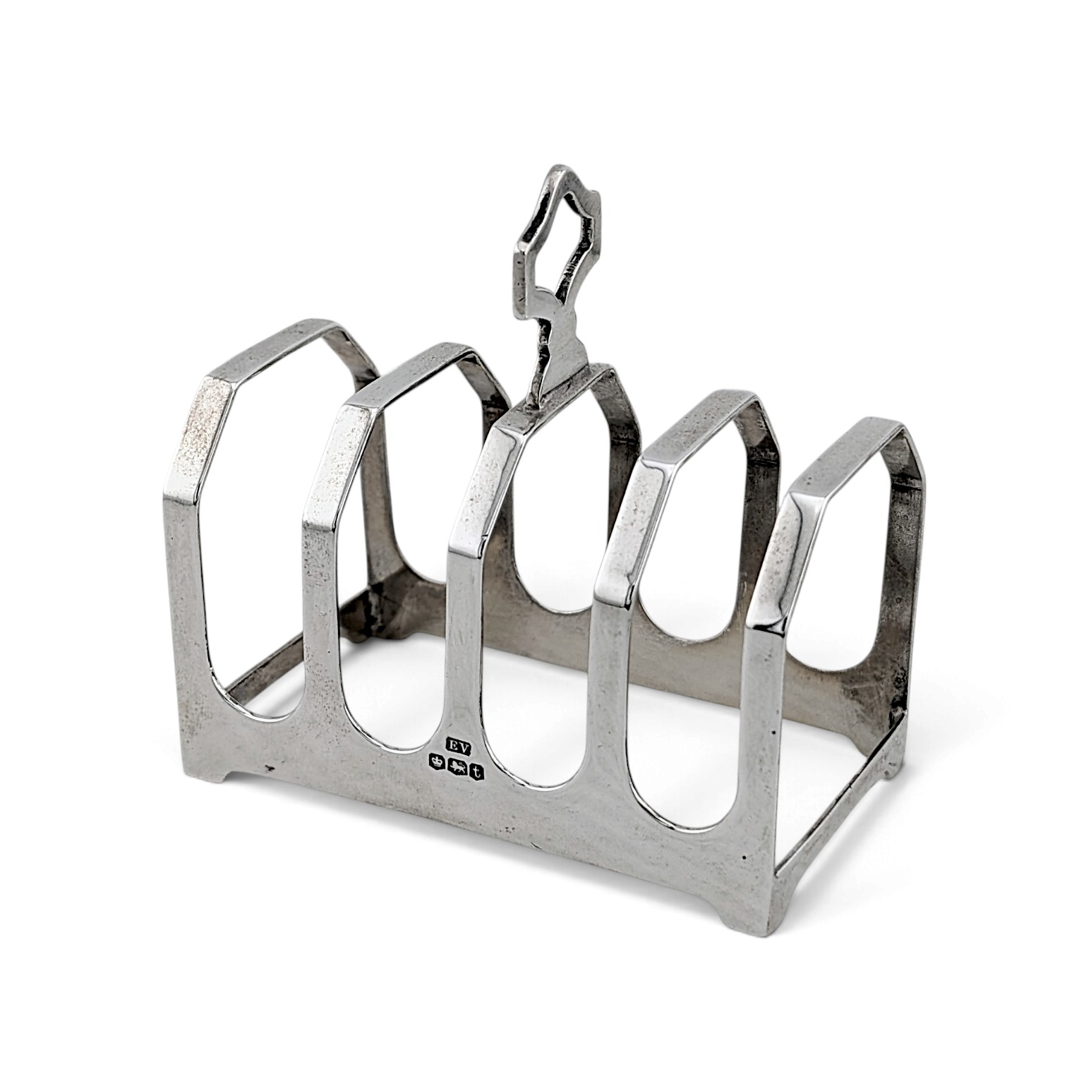 Silver four-division toast rack with central carrying handle, Sheffield 1936