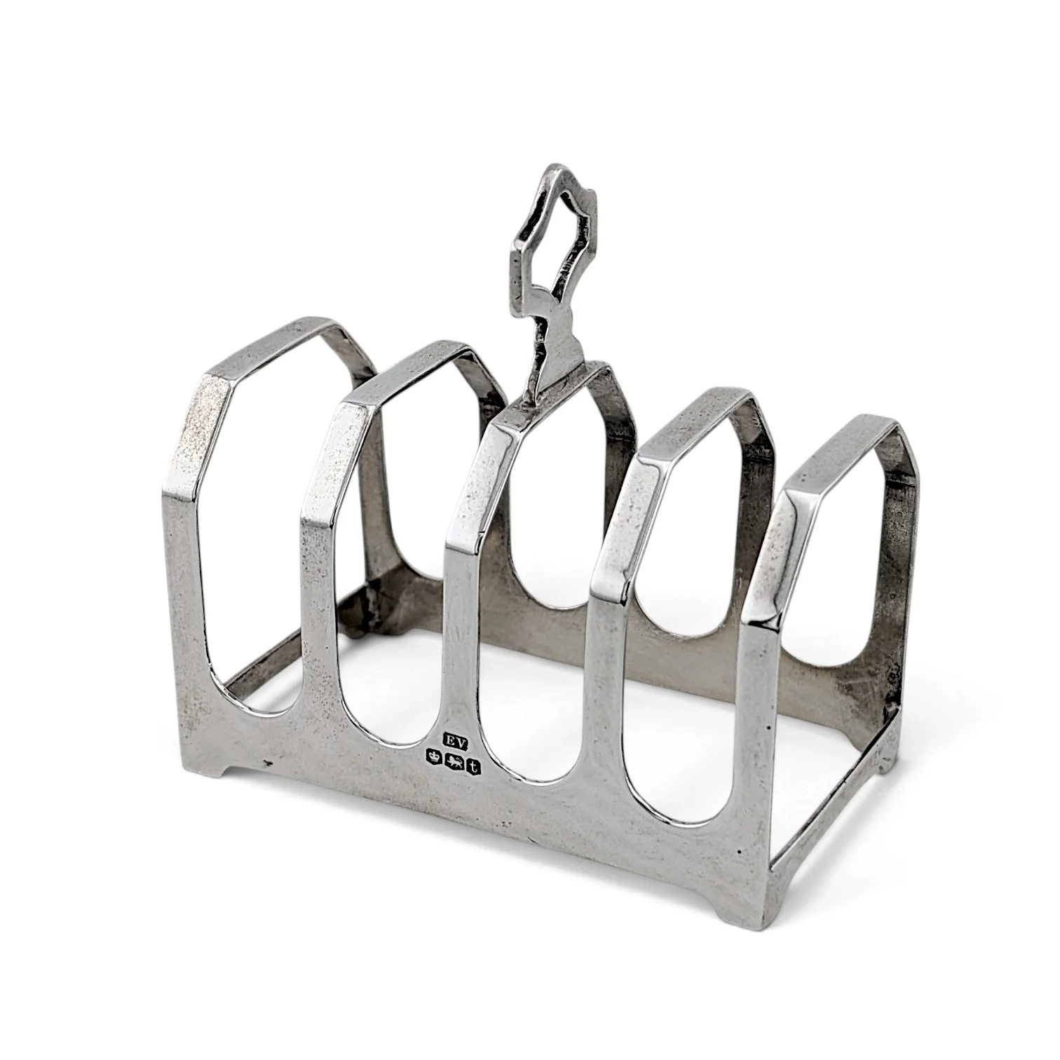 Silver four-division toast rack with central carrying handle, Sheffield 1936