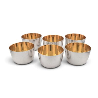 Six silver tumbler cups with gilded interiors