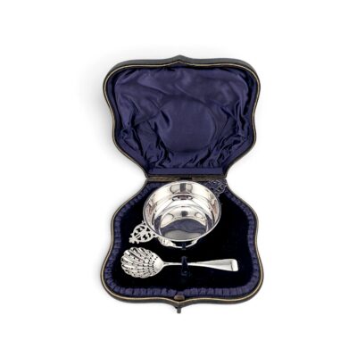 Porringer and pierced spoon in their original fitted case