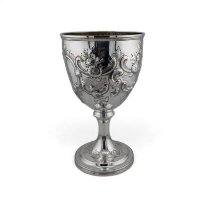 Georgian silver goblet chased with flowers and foliage around a central cartouche