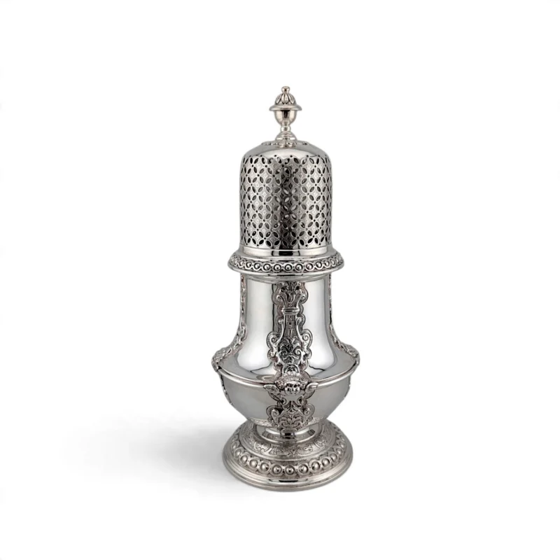 Single decorative caster showing the pierced cover