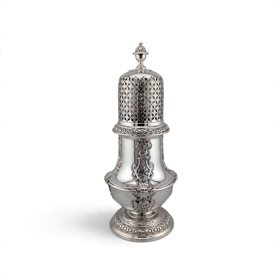 Single decorative caster showing the pierced cover