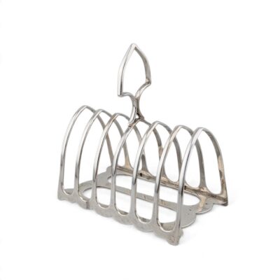 Silver toast rack with arched bars and a central handle